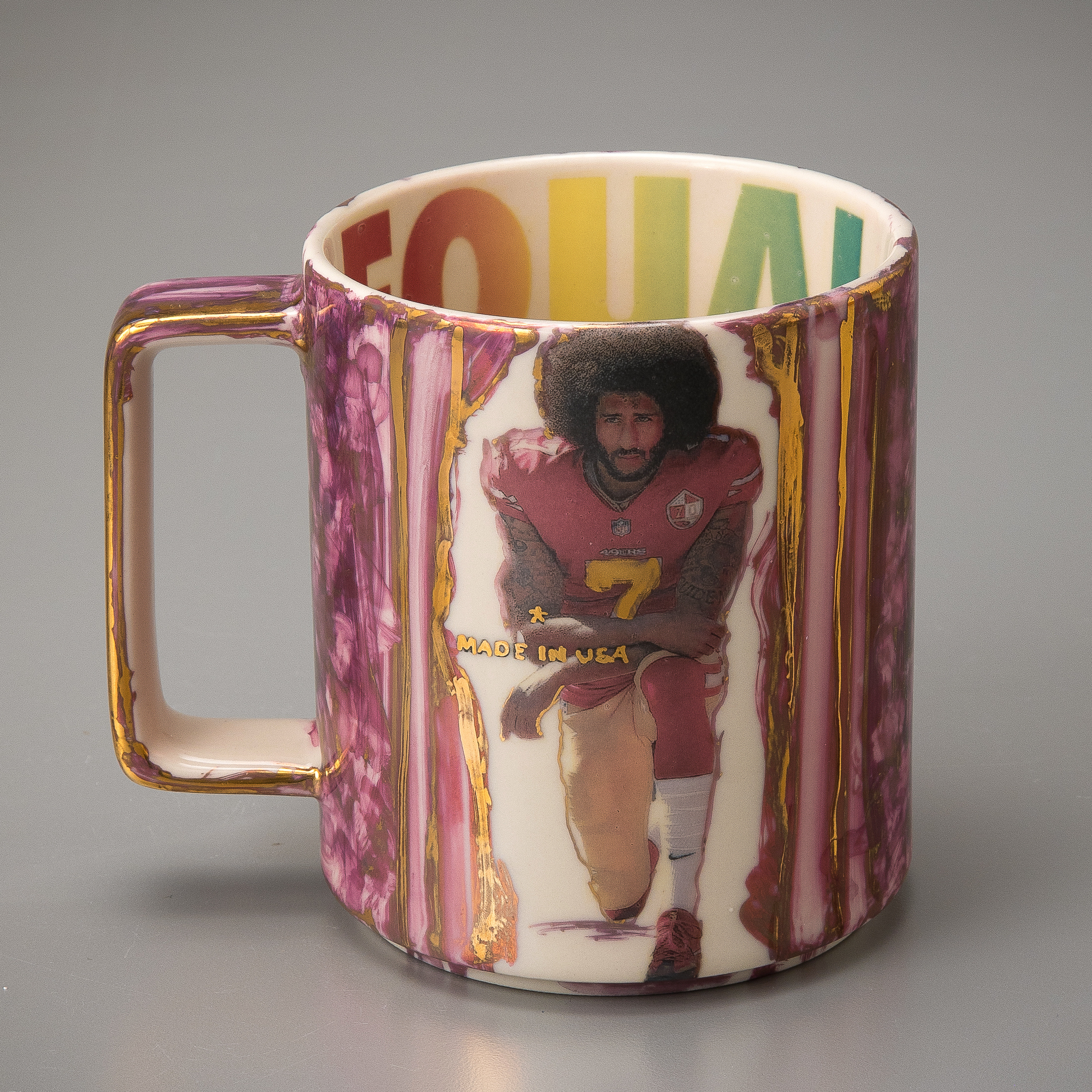 from the <i>MADE IN USA</i> series, 2020, commercial Starbucks “MADE IN USA” mug with artist’s ceramic transfer designs and gold and pink luster enamel, height: 4.5 in. Collection of the Chipstone Foundation.